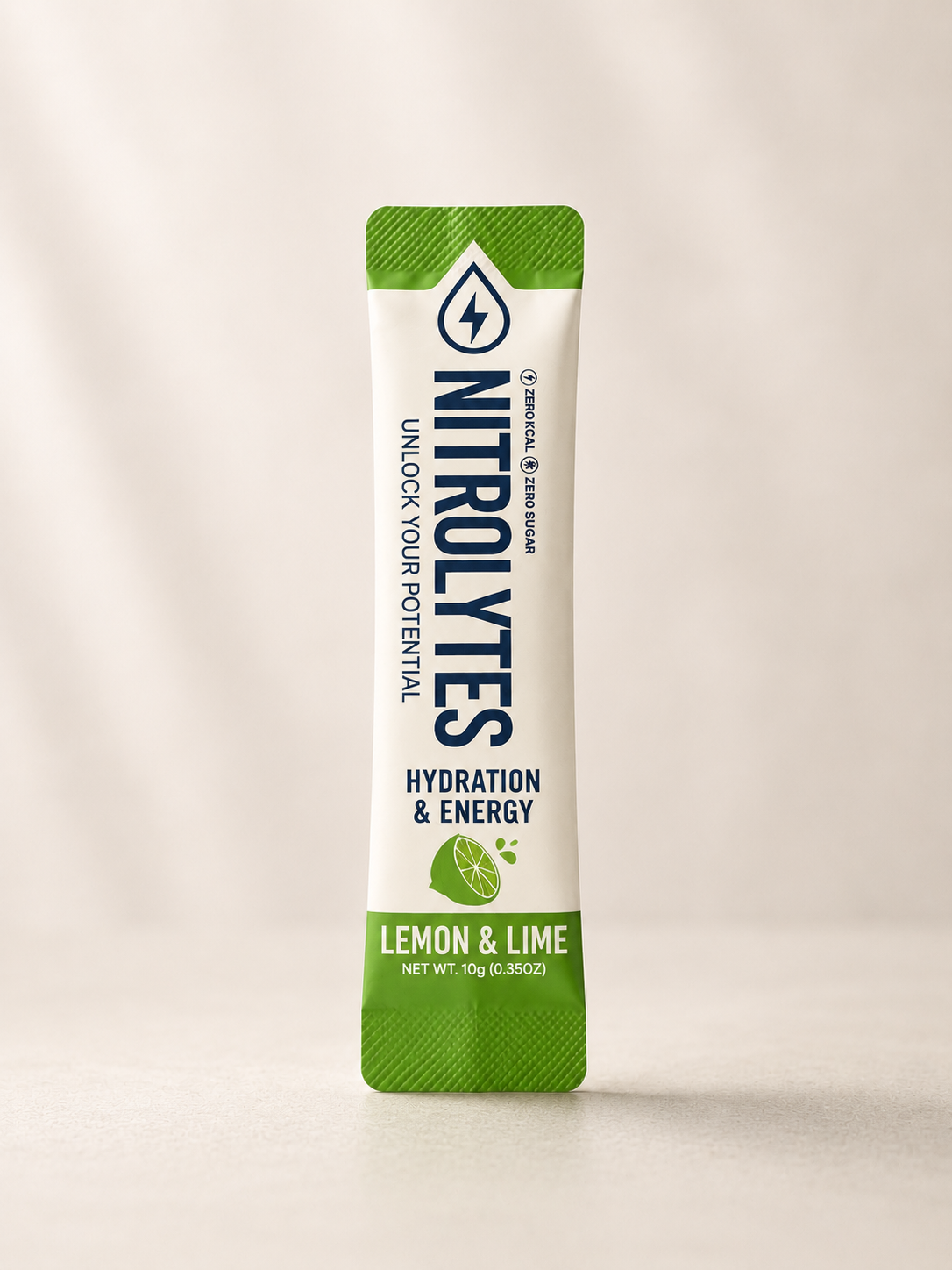 A single Nitrolytes Lemon & Lime hydration and energy stick pack standing upright on a light beige surface against a matching neutral background.